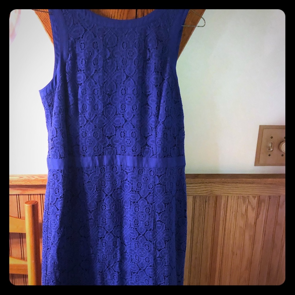 Sleeveless shell dress with interior lining.